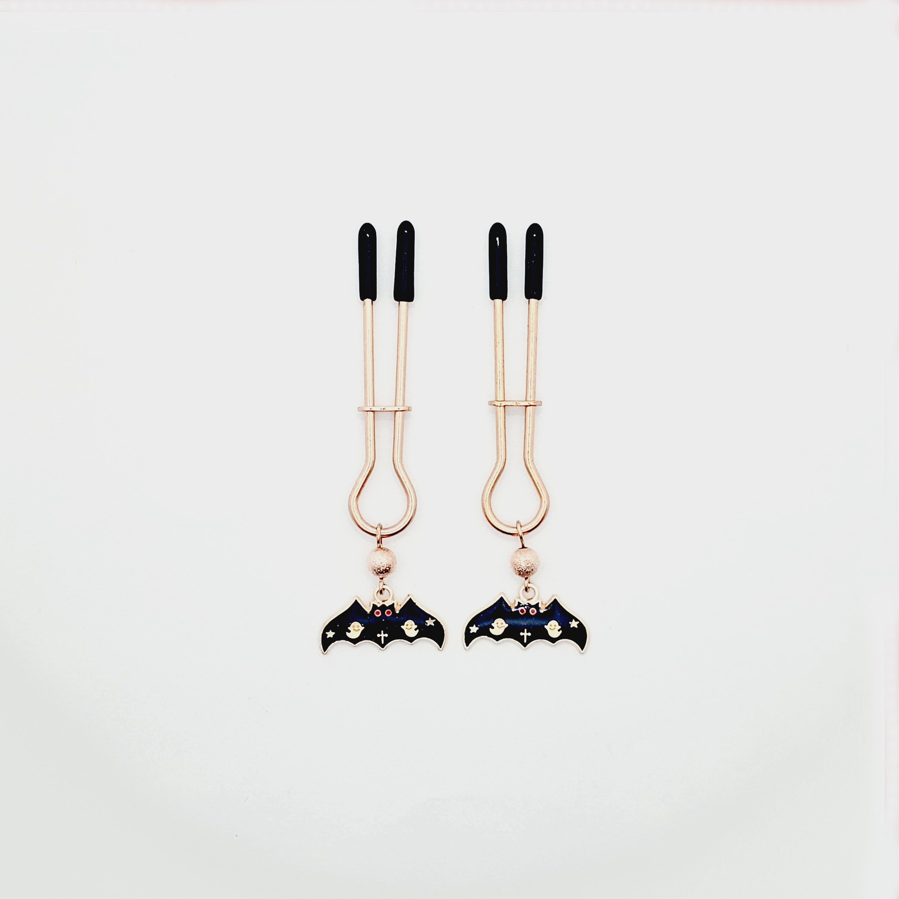 Spooky Nipple Clamps for Halloween. Rose Gold Straight Tweezer Clamps with Bats.