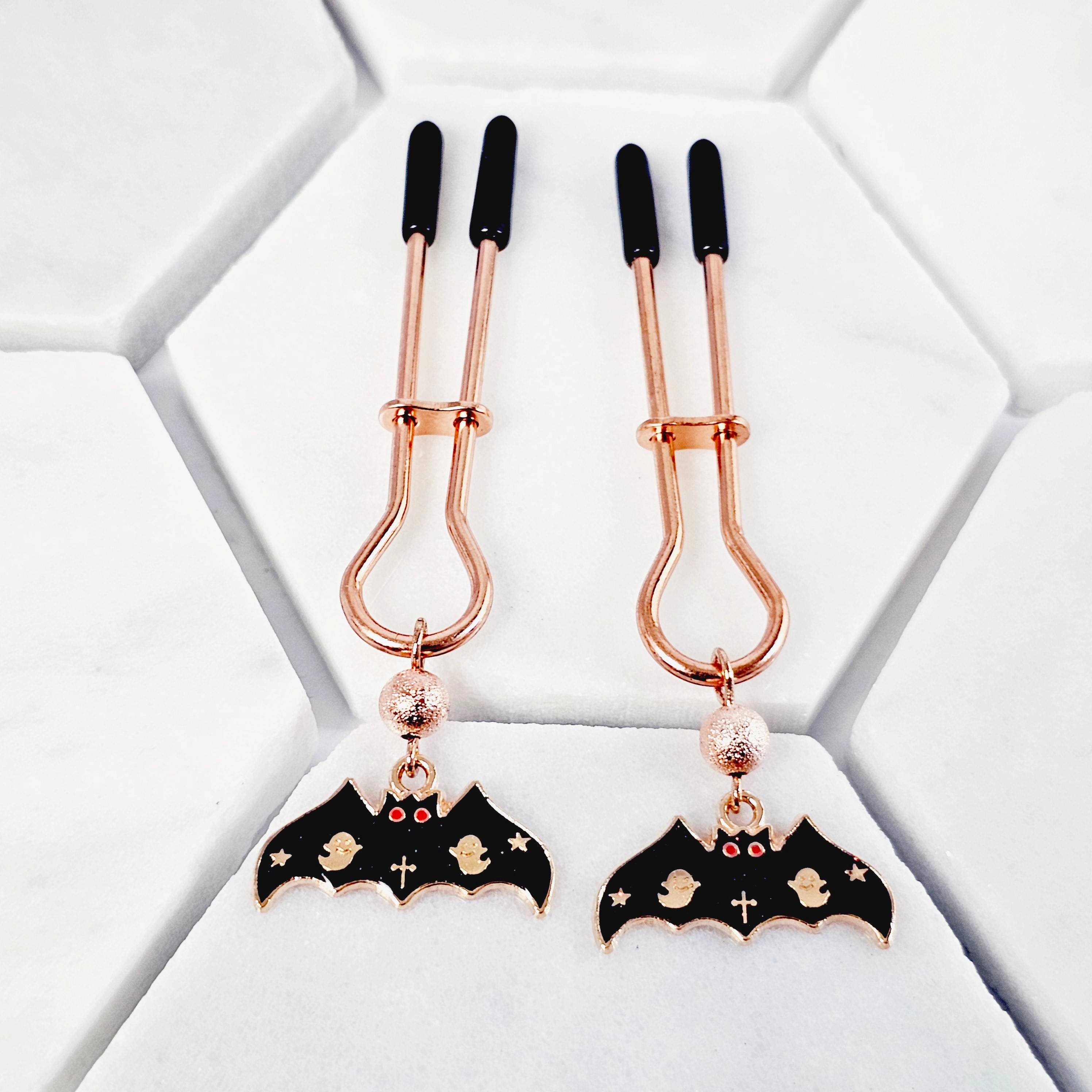 Spooky Nipple Clamps for Halloween. Rose Gold Straight Tweezer Clamps with Bats.