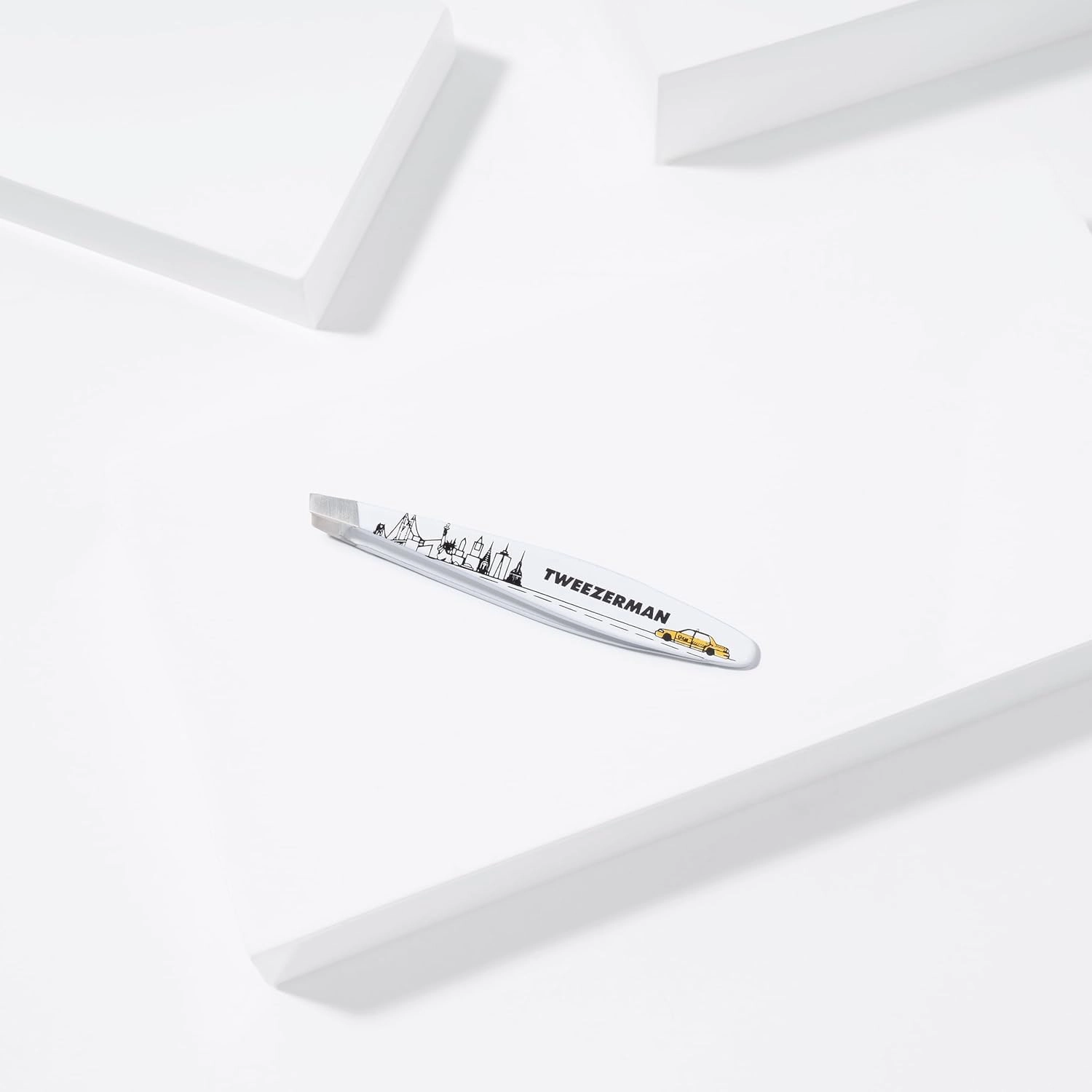 Tweezerman NYC Mini Slant Tweezer - Tweezers for Eyebrows, Travel Tweezers for Eyebrows, Facial Hair, Ingrown Hair